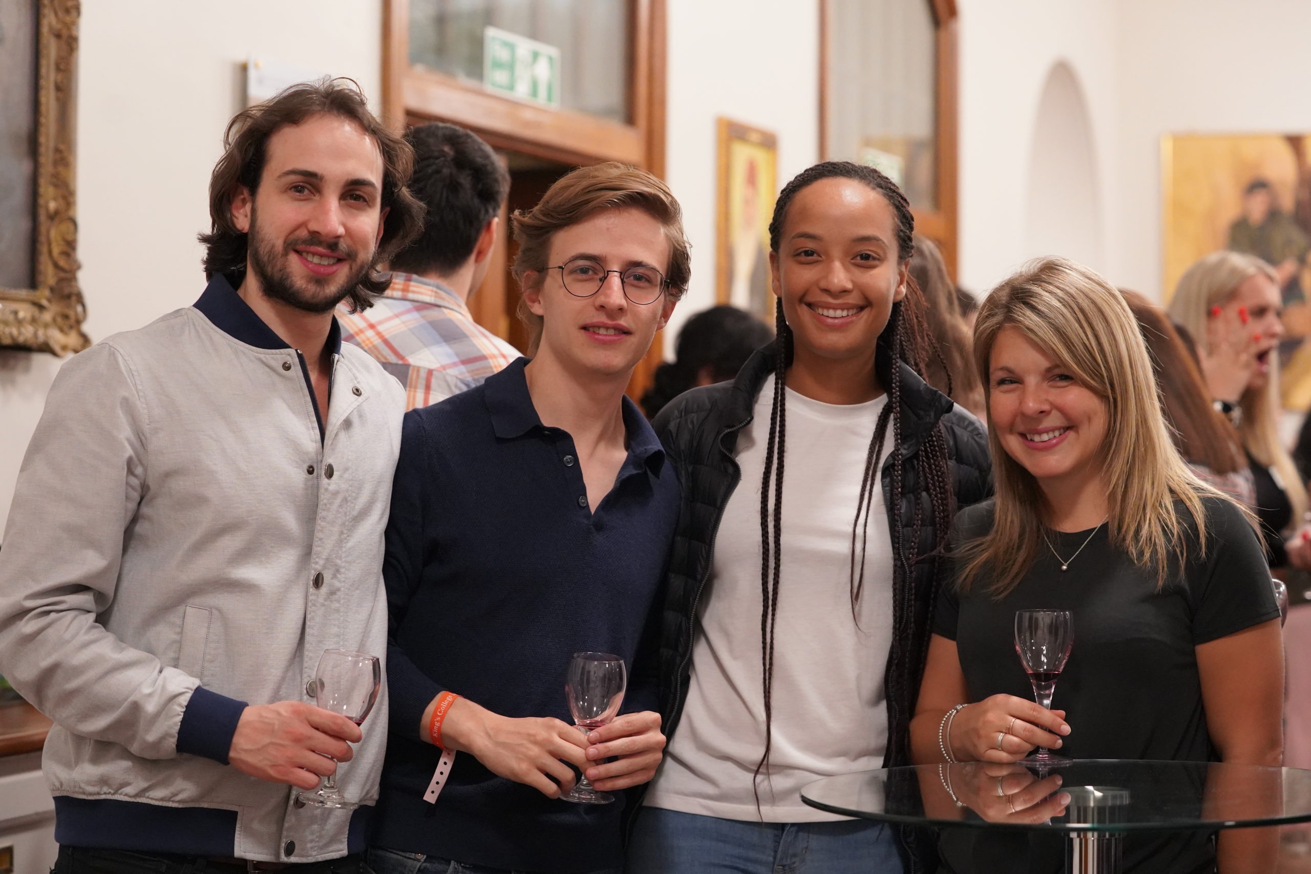 Members having welcome drinks in 2019