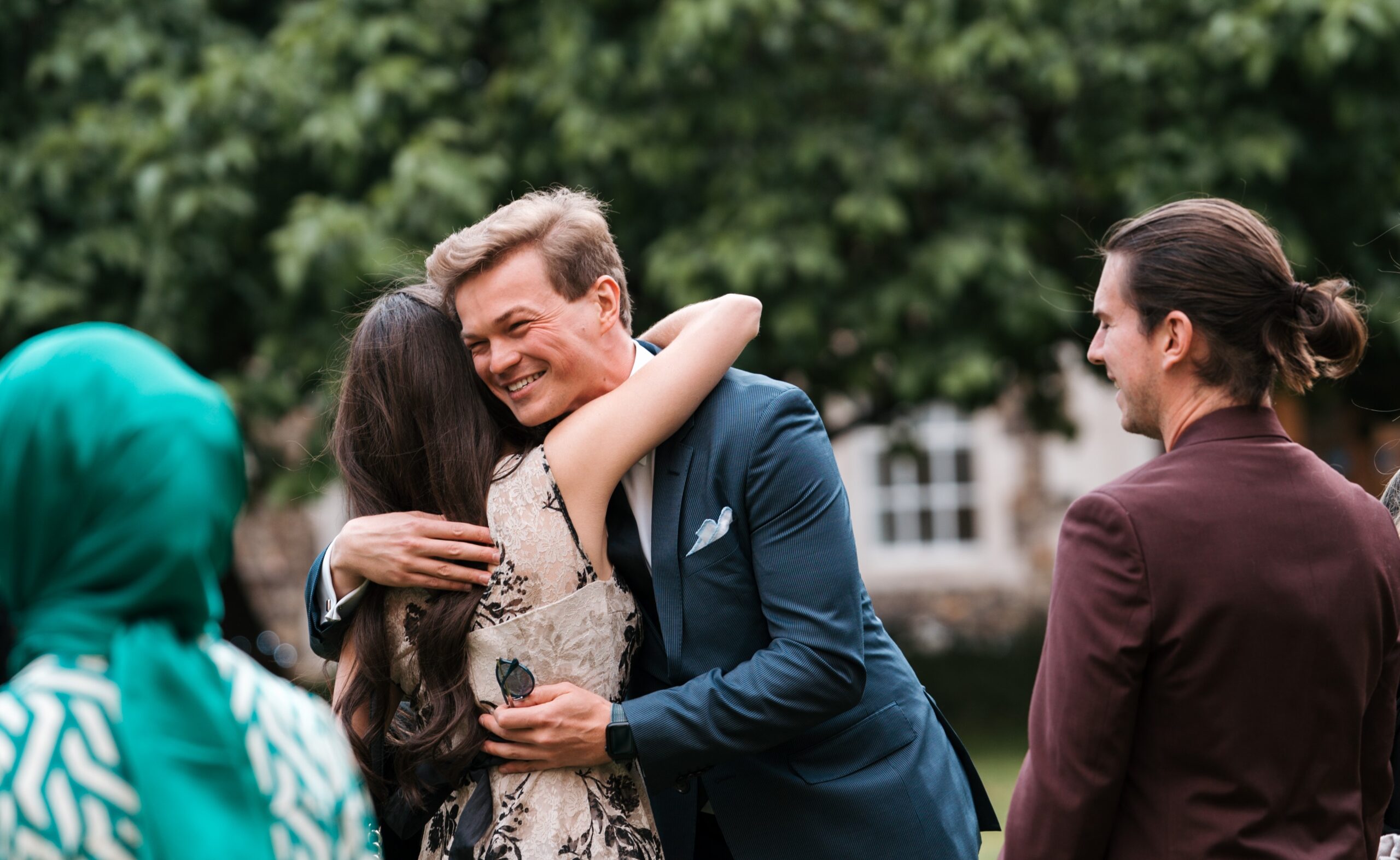 Goodenough College Members exchange a friendly hug