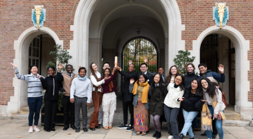 Goodenough student Members celebrating the College winning an award